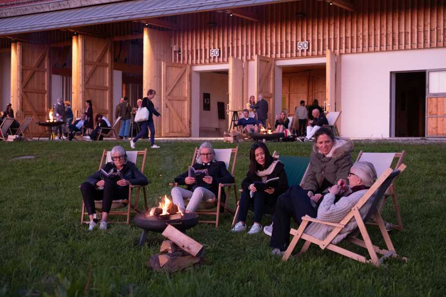 A group of people at the fireside